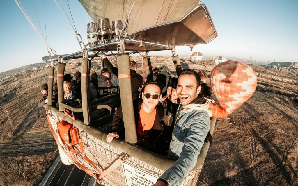 Psychology of Traveling With Friends on a balloon trip in sky